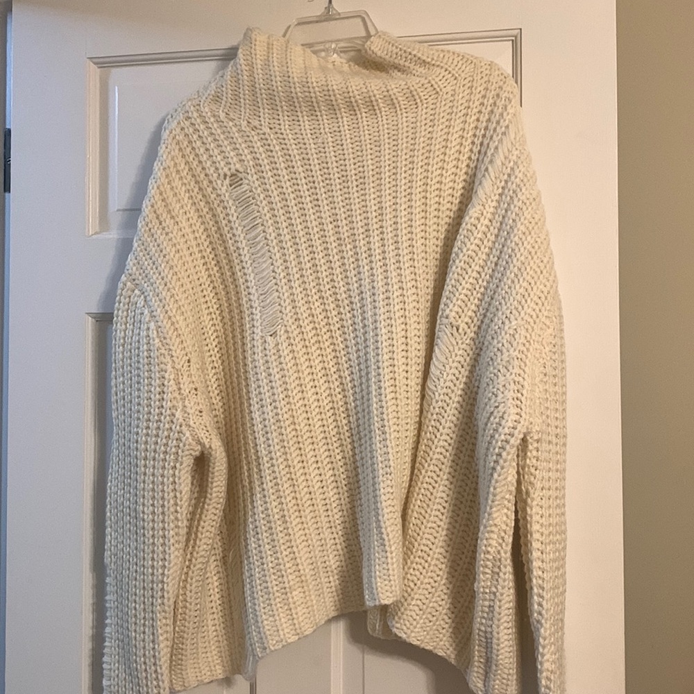 Brand New Umgee short oversized cream sweater. Large but fit more like a Xl.RB
